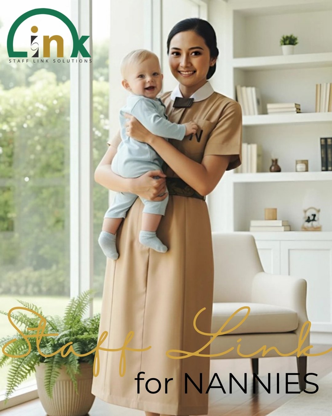 Staff Link nanny in uniform holding a smiling baby